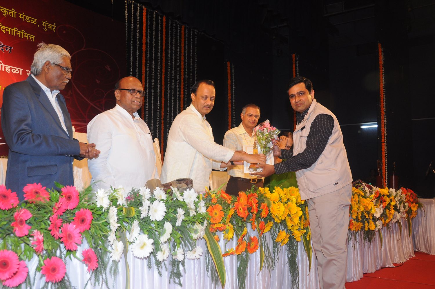 Receiving the Maharashtra State Government Literary Award for Shortcut